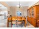 Traditional dining room boasts a wooden table set and complementary wooden hutch for stylish storage at 3505 Seaway Dr, New Port Richey, FL 34652