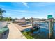 Waterfront property with boat lift, dock, and canal access, offering direct access to the open water at 3505 Seaway Dr, New Port Richey, FL 34652