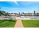 Canal-front property with a walkway leading to a private dock and boat slip providing direct water access at 3505 Seaway Dr, New Port Richey, FL 34652