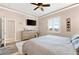 Bedroom features a ceiling fan, and light walls, creating a serene atmosphere at 3505 Seaway Dr, New Port Richey, FL 34652