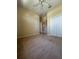A large, carpeted bedroom with double closets and natural light at 446 Noble Faire Dr, Sun City Center, FL 33573