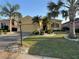 Charming one-story home featuring manicured landscaping and a welcoming two-car garage at 446 Noble Faire Dr, Sun City Center, FL 33573
