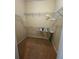 Functional walk-in closet with ample shelving, offering practical storage solutions at 446 Noble Faire Dr, Sun City Center, FL 33573