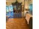 Cozy dining area featuring a built-in hutch and seamless access to the outdoor patio through sliding glass doors at 4504 Cabbage Palm Dr, Valrico, FL 33596