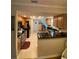 Open kitchen layout with breakfast bar, modern appliances, and tile flooring at 4504 Cabbage Palm Dr, Valrico, FL 33596