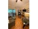 Cozy living room with ample natural light, comfortable seating, and stylish decor at 4504 Cabbage Palm Dr, Valrico, FL 33596
