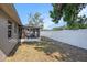 View of screened lanai and fenced backyard at 512 Red Mangrove Ln, Apollo Beach, FL 33572