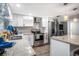 Updated kitchen boasts granite countertops, stainless steel appliances, and ample cabinet space at 512 Red Mangrove Ln, Apollo Beach, FL 33572