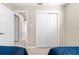 Bedroom with a closet featuring double doors at 5519 Homewood Dr, Sarasota, FL 34232