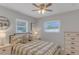 Bright bedroom with two large windows and custom side tables at 5591 15Th N Ave, St Petersburg, FL 33710