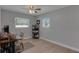 Bedroom features new laminate flooring, closet and bright natural light at 5591 15Th N Ave, St Petersburg, FL 33710