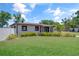 Well-kept single-story home with manicured front yard and fresh landscaping at 5591 15Th N Ave, St Petersburg, FL 33710