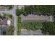 A bird's eye view shows the property's location, landscaping, roof condition, and neighborhood streets at 5864 Nature Terrace Cv, Tampa, FL 33617