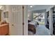 Main bedroom with en-suite bathroom, balcony access, and ample closet space at 5864 Nature Terrace Cv, Tampa, FL 33617