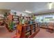 Cozy library with an extensive book collection and comfortable seating creates a quiet reading space at 5980 Terrace Park N Dr # 214, St Petersburg, FL 33709