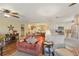 Inviting living space flows to dining & kitchen, featuring stylish decor and an open floor plan at 5980 Terrace Park N Dr # 214, St Petersburg, FL 33709