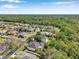 An aerial view of the neighborhood with mature landscaping at 6130 Japonica Ct, New Port Richey, FL 34655