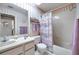Clean bathroom featuring a shower-tub combination and vanity with sink at 6428 Remus Dr, New Port Richey, FL 34653