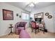 Charming bedroom with a decorative mirror, ceiling fan, and ample natural light at 6428 Remus Dr, New Port Richey, FL 34653