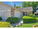 Charming home with a well-manicured lawn and inviting walkway leading to the front entrance at 6428 Remus Dr, New Port Richey, FL 34653