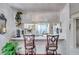 Bright kitchen and breakfast bar with seating for two at 6428 Remus Dr, New Port Richey, FL 34653