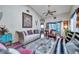 Inviting living room with vaulted ceilings, elegant furnishings, and lots of natural light at 6428 Remus Dr, New Port Richey, FL 34653