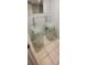 Stylish bathroom featuring dual vessel sinks with modern fixtures and frosted glass stands at 701 S Madison Ave # 316, Clearwater, FL 33756