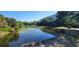 Scenic view of a pond surrounded by lush greenery near the property, offering a peaceful environment at 701 S Madison Ave # 316, Clearwater, FL 33756