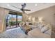 Open living room featuring a large sectional and scenic outdoor views at 7339 Skybird Rd # 7339, Bradenton, FL 34209