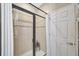 Tiled shower with glass door at 7339 Skybird Rd # 7339, Bradenton, FL 34209