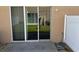Sliding glass doors opening onto a patio and outdoor space, creating a seamless transition at 778 Spring Flowers Trl, Brandon, FL 33511