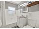 Clean bathroom with tub, shower, and modern vanity at 7800 Causeway N Blvd, St Petersburg, FL 33707