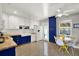 Bright kitchen featuring white cabinetry, butcher block countertops, and a cozy breakfast nook at 7800 Causeway N Blvd, St Petersburg, FL 33707