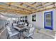 Covered patio with dining and seating areas, perfect for entertaining at 7800 Causeway N Blvd, St Petersburg, FL 33707