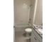 Clean bathroom featuring a shower-tub combo and granite countertop vanity at 7937 Wheat Stone Dr, Zephyrhills, FL 33540