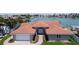 Charming single-Gathering home with an attached two-car garage and tile roof at 8053 13Th S Ave, St Petersburg, FL 33707