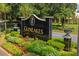 Welcoming GlenLakes entrance sign, showcasing lush landscaping and community pride at 9398 N Burnam Dr, Weeki Wachee, FL 34613