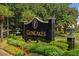 Elegant GlenLakes community sign with manicured landscaping and lush greenery at 9398 N Burnam Dr, Weeki Wachee, FL 34613