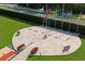 Overhead shot of a brick paved memorial with flags, benches, and flower planters for quiet reflection at 9398 N Burnam Dr, Weeki Wachee, FL 34613
