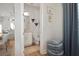 Tastefully decorated half bathroom features a vanity, toilet, decorative shelves, and neutral paint at 946 Highland Ave # 47, Dunedin, FL 34698