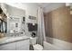 Well-appointed bathroom featuring a shower and tub with vanity for a comfortable bathing experience at 946 Highland Ave # 47, Dunedin, FL 34698