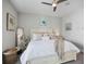 Serene bedroom with a comfortable bed, mirror and natural light, perfect for relaxing and unwinding at 946 Highland Ave # 47, Dunedin, FL 34698