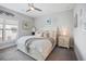 Elegant bedroom with a plush bed, neutral tones, and ample natural light, creating a serene retreat at 946 Highland Ave # 47, Dunedin, FL 34698