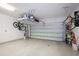 Spacious garage with epoxy floors and overhead storage system at 946 Highland Ave # 47, Dunedin, FL 34698