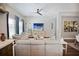 Spacious living room featuring hardwood floors, stylish decor, and ample natural light at 946 Highland Ave # 47, Dunedin, FL 34698