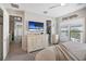 Bright main bedroom with a dresser, walk-in closet, shuttered windows and ceiling fan at 946 Highland Ave # 47, Dunedin, FL 34698