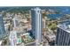 A partial aerial view of a residential tower with the ocean in the background at 100 1St N Ave # 3104, St Petersburg, FL 33701