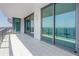 A wide balcony offering water views, with floor-to-ceiling windows and glass railings at 100 1St N Ave # 3104, St Petersburg, FL 33701