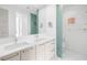 Contemporary bathroom with double vanity, sleek fixtures, and modern finishes at 100 1St N Ave # 3104, St Petersburg, FL 33701