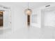 Bright bedroom with closet and modern chandelier at 100 1St N Ave # 3104, St Petersburg, FL 33701